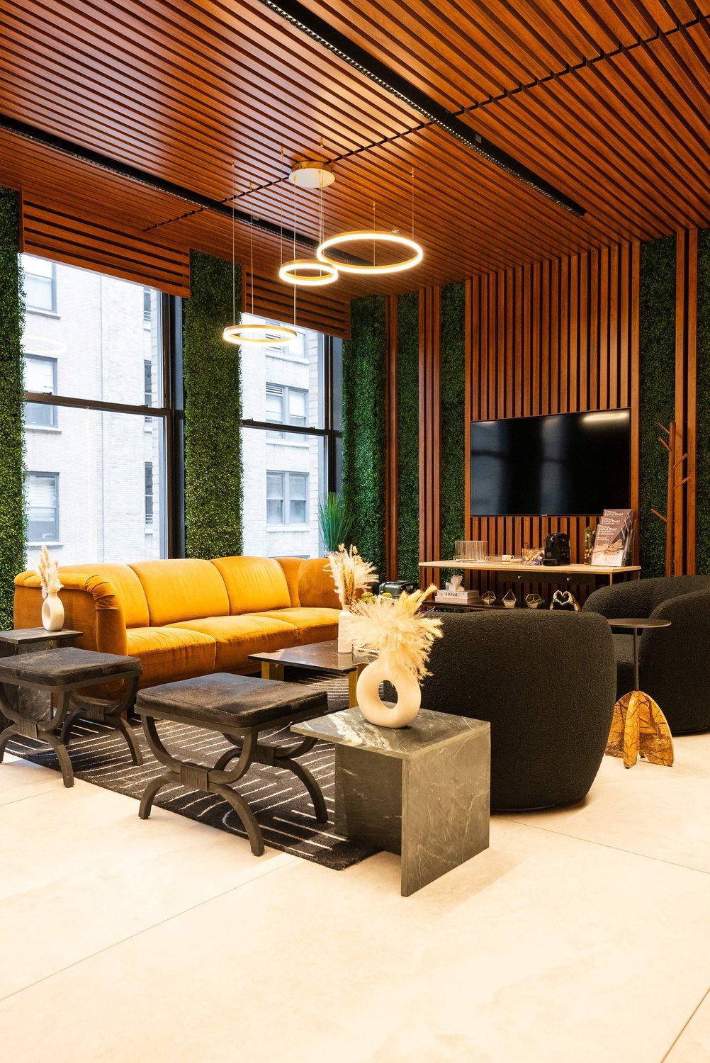 Another angle of the New York clinic lobby with orange sofa and ring lights